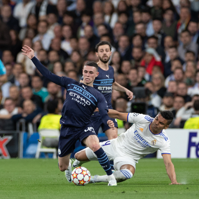 Madrid, Champions League 21/22, Real Madrid CF-Manchester City, giocata allo stadio Santiago Bernabeu, nella foto: Casemiro y Phil Foden
